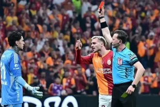 Referee giving red card