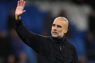 Pep Guardiola waving