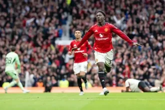 Kobbie Mainoo celebrating