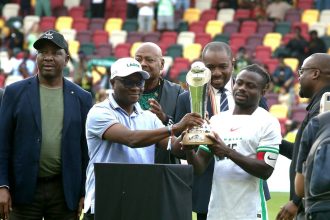 Moses Simon lifting Unity Cup